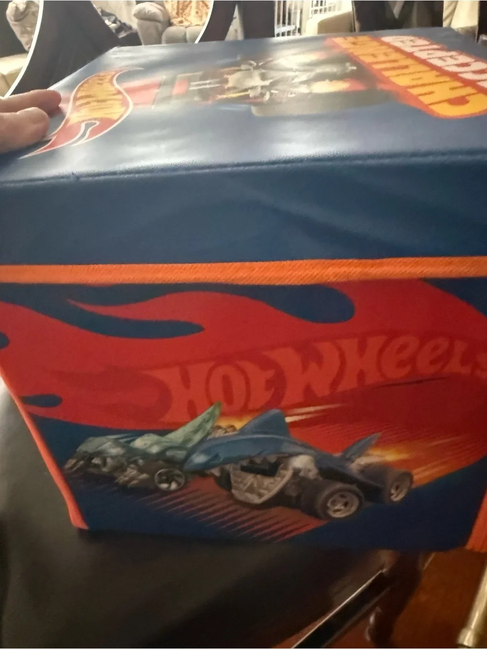 Hot wheels box that unzips as a playmat for cars
